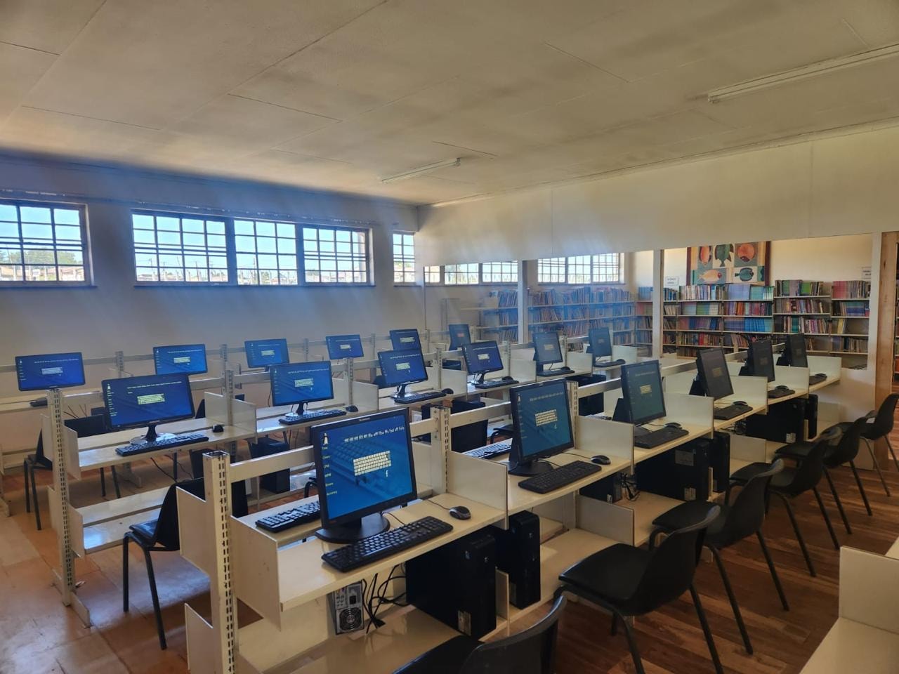 Students in a computer lab at Study Sync Solutions